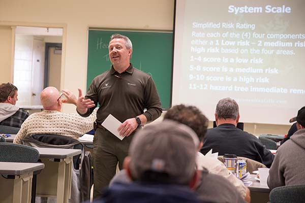 Hazardous Tree Identification instructor Ted Szczawinski smiling while teaching class