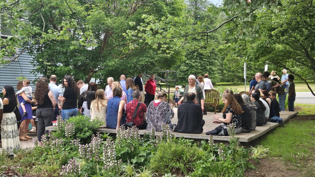 Guests at the dedication enjoy the teaching garden