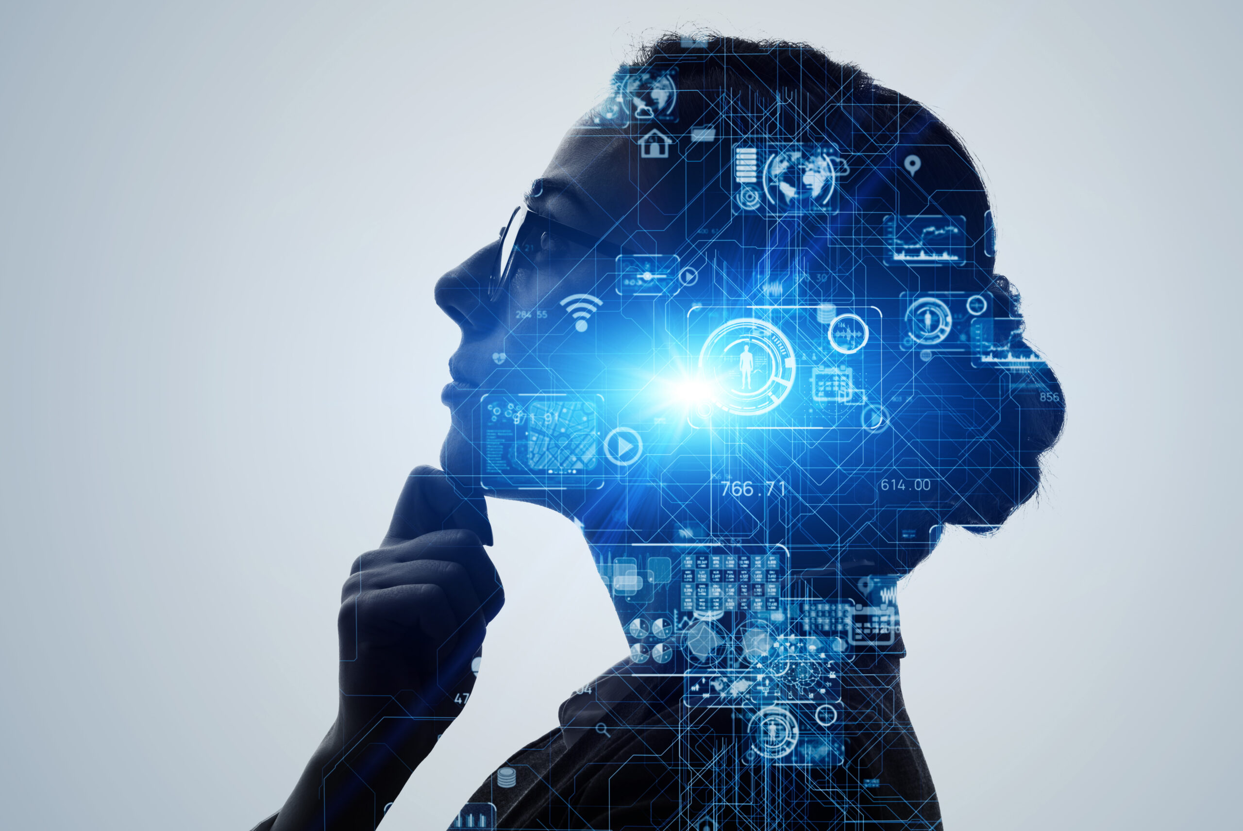 Silhouette of woman with ai technology symbols