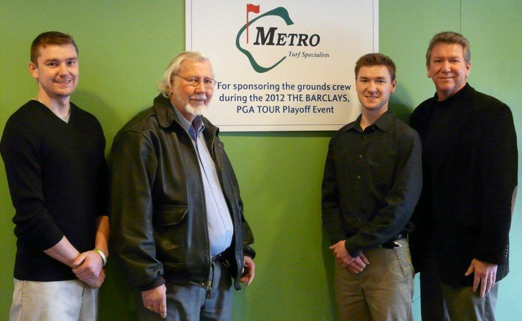 Richard, Richard, Todd and Scott Apgar standing next to Metro Turf Specialists sign