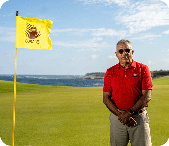 Rutgers Turf alum, Julio Diaz standing at Corales Puntacana