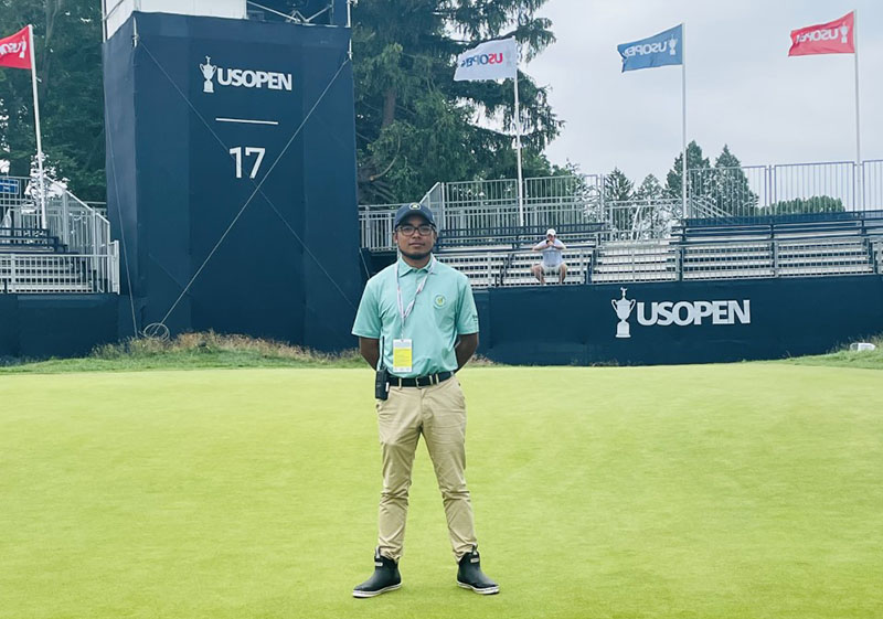 Rutgers Turf alumnus Dhenilson Pizarro Moreno at the 122nd US Open Championship