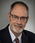 Headshot of instructor Dolf DeRovira