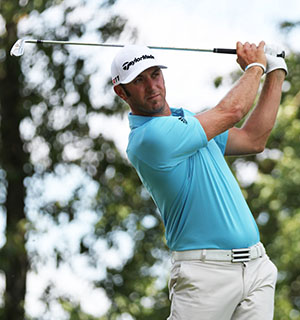 Dustin Johnson swinging golf club