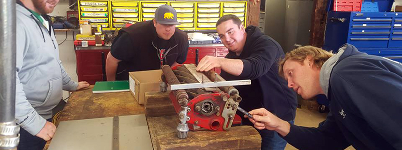 Turf students participate in a hands-on reel grinding class