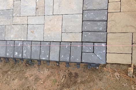 Concrete pavers with string line