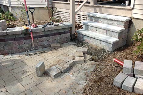 Decorate wall, walkway, and stairs constructed with concrete pavers