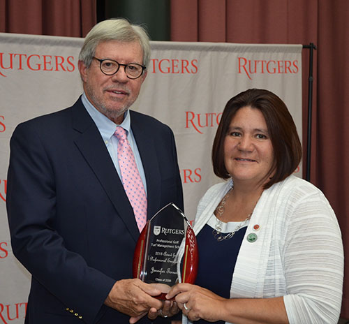 Rutgers Turf alumna Jennifer Torres receiving the 2018 Professional Golf Turf Management School Award for Rutgers Professional Excellence