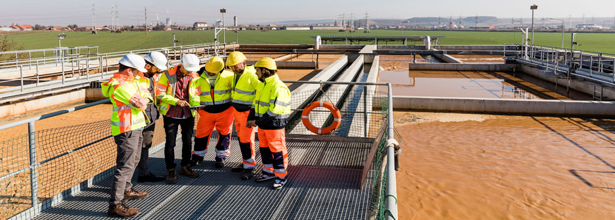 Group of wastewater operators assessing plant performance