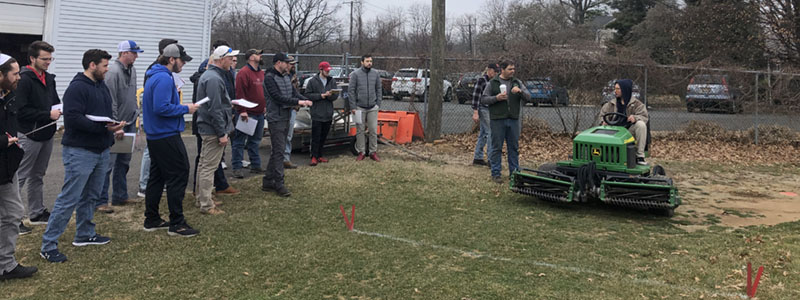 Turf students engaged in an outdoor Mower Technology class