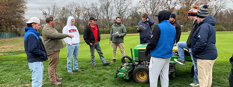 Rutgers Turf Instructor Joe Clark teaches a Mower Technology lesson to Two-Year Turf Certificate Students