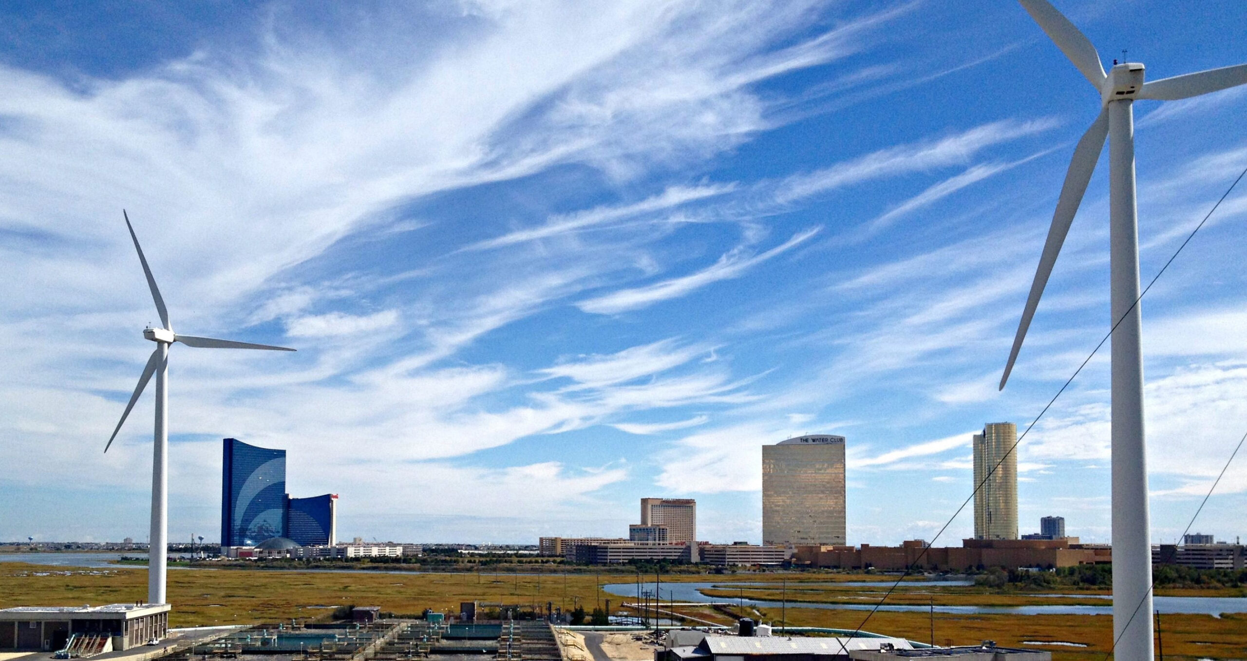 Wind turbines with Atlantic City skyline in the background