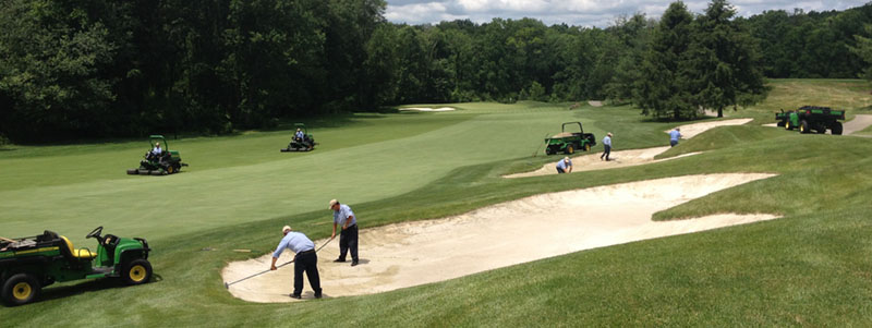 Crew members hard at work at the TPC Jasna Polana golf course