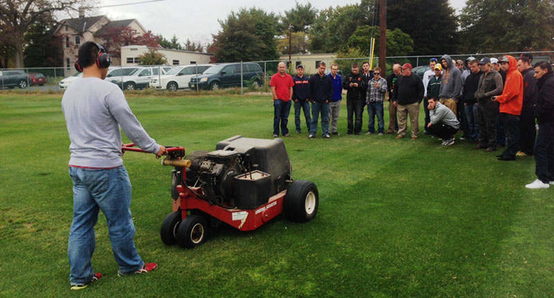 Turf students in a Mower Technology class on the Rutgers Horticulture Research Farm