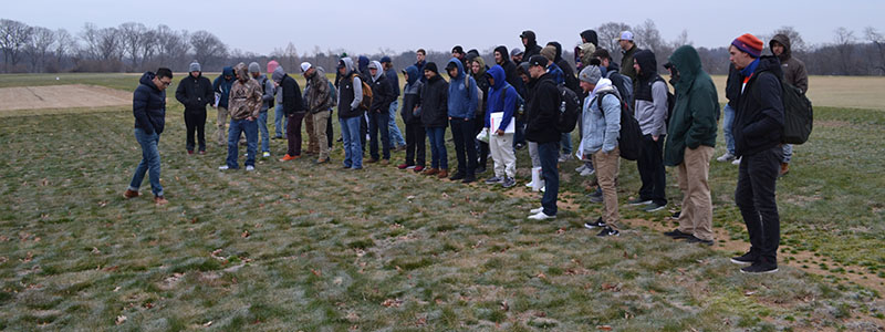 Turf management students outside on Rutgers turf plots