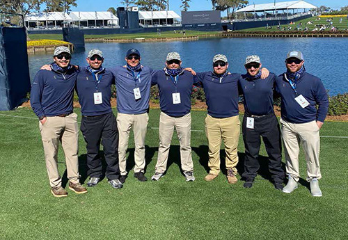 Group of Two-Year Turf Alumni working The Players Championship at TPC Sawgrass