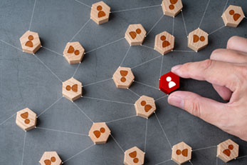 Business & HR icon on hexagon puzzle representing human capital audit