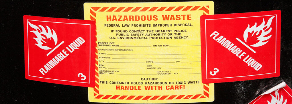 Hazardous Waste Labels on a Barrel of Chemicals