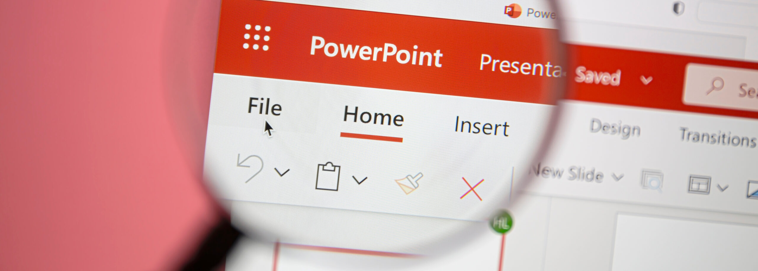 Magnify glass hovering over Microsoft PowerPoint interface home button