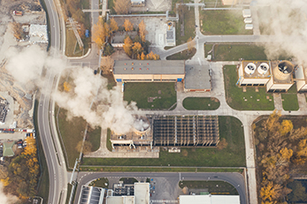 aerial view of emissions coming from industrial site