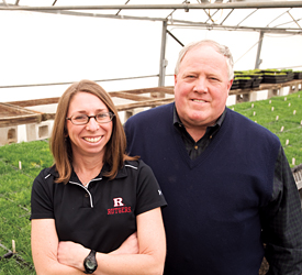 Dr. William Meyer and Dr. Stacy Bonos in the greenhouse
